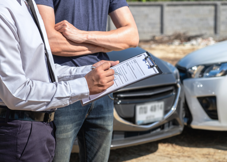 A man describing the accident and managing the insurance claim after a car accident.