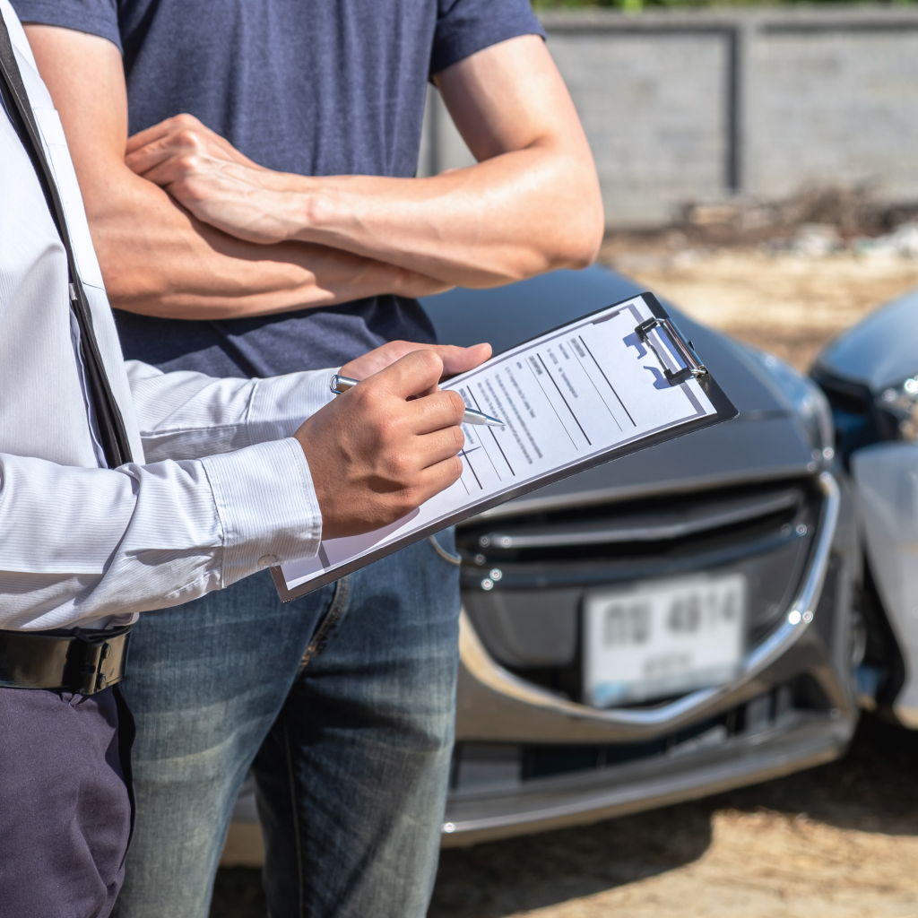 A man describing the accident and managing the insurance claim after a car accident.